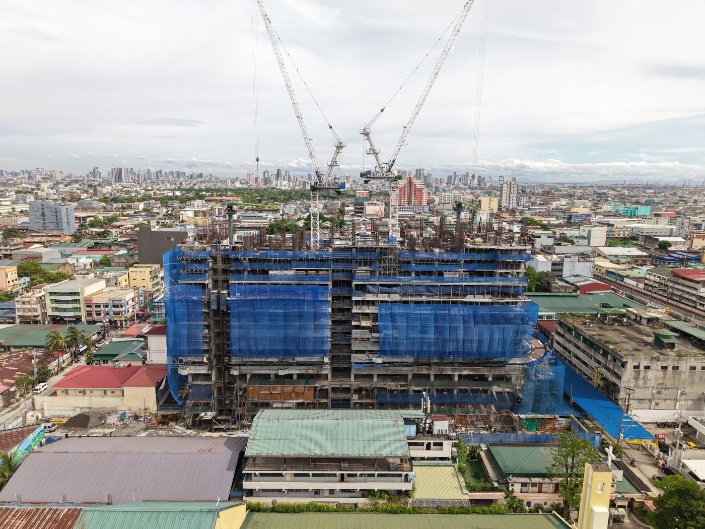The Calinea Tower under construction, aerial view over East Grace Park, Caloocan City