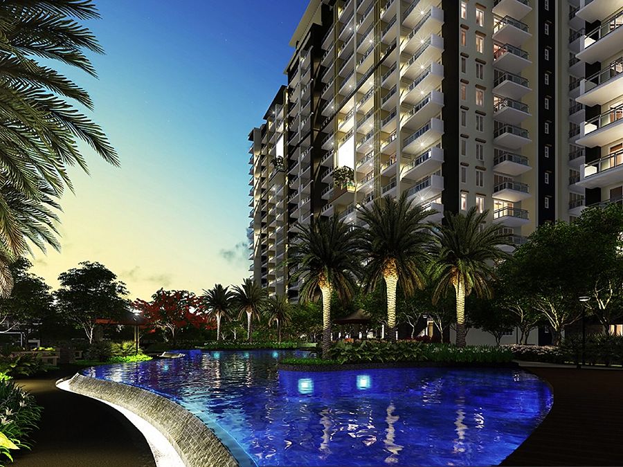Alder Residences by DMCI Homes — leisure pool and mid-rise buildings in Acacia Estates, Taguig City.