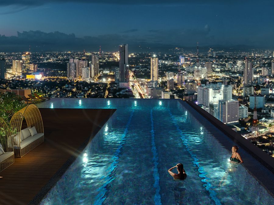 One Delta Terraces by DMCI Homes — sky pool overlooking Quezon City at night. Architect's perspective.