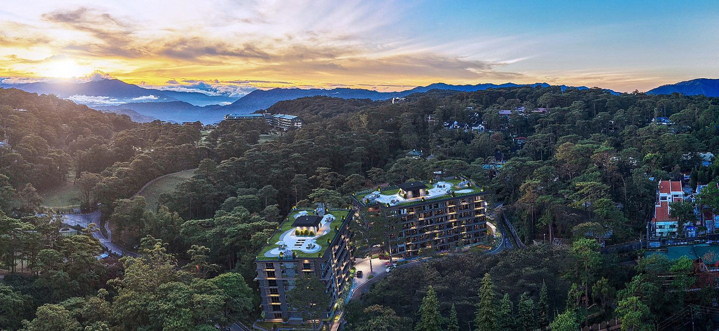 One South Drive, Baguio City — aerial view over the pine forest at sunrise. Developed by Dacon Corporation, managed by DMCI Project Developers. Architect's visualisation.