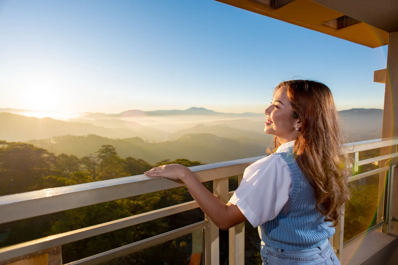 Sunrise over the mountains from a Moncello Crest balcony