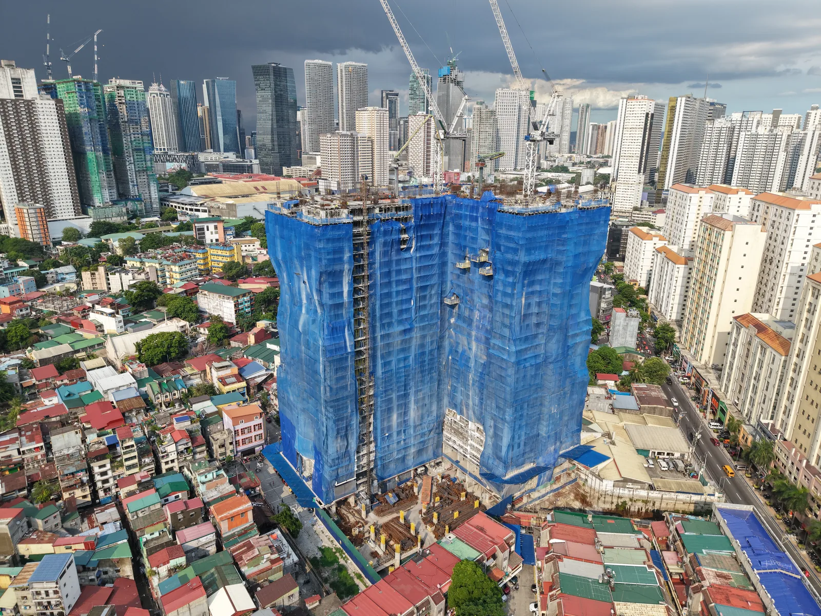 Sage Residences construction aerial, July 2026